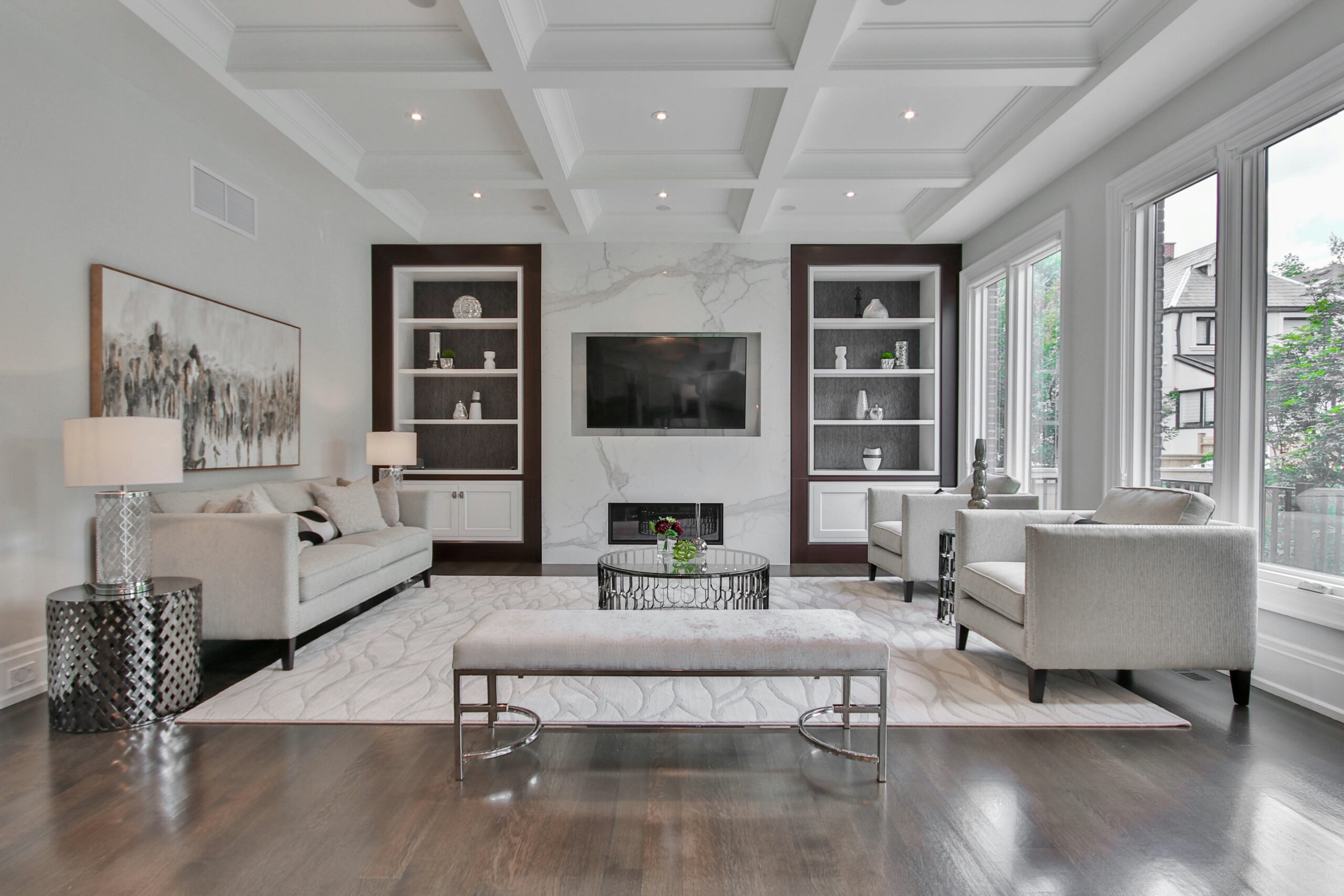 Spacious luxury home interior with custom cabinetry and lighting